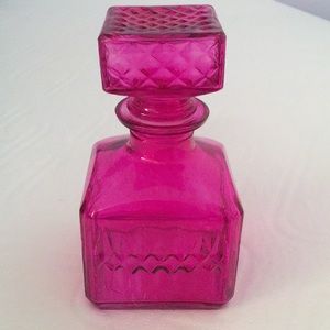 Vintage-like pink glass perfume jar